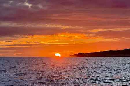 Sunset in Portugal on a boat cruise with Body Flows Yoga Retreat